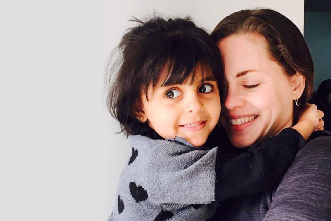 Megan with a refugee girl