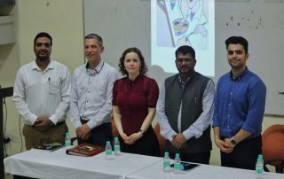 Delivering lectures at Galgotias University